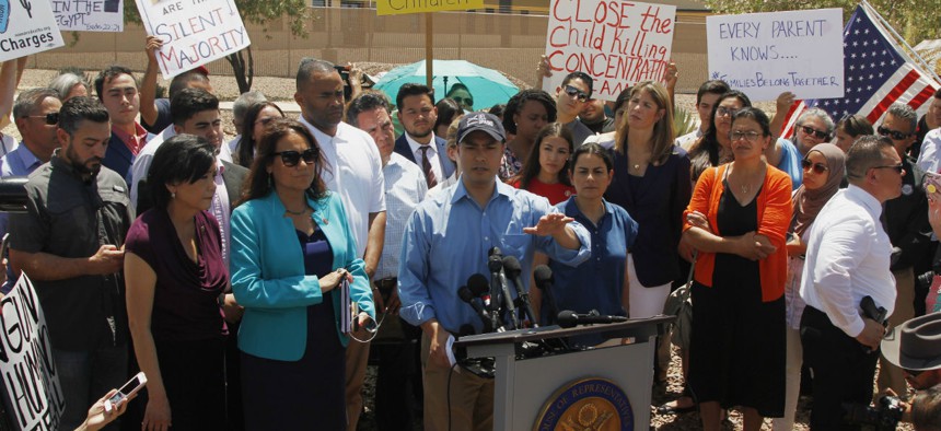 Rep. Joaquin Castro, D-Texas, speaks alongside members of the Hispanic Caucus after touring the inside of the Border Patrol station in Clint, Texas, on Monday.