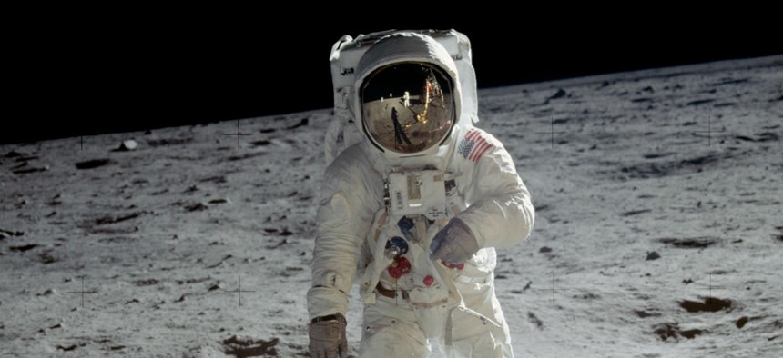 Astronaut Buzz Aldrin walks on the surface of the moon near the leg of the lunar module Eagle during the Apollo 11 mission. 