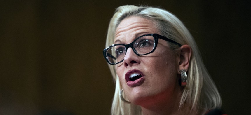 Sen. Kyrsten Sinema, D-Ariz., asked the nominee about her commitment to federal labor law. 