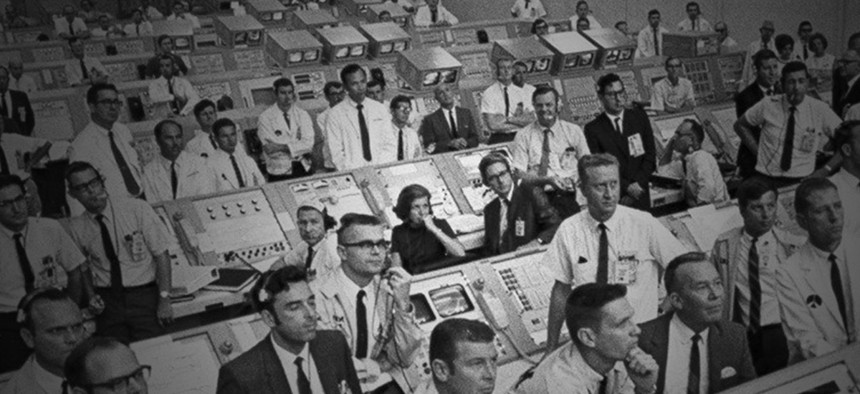 JoAnn Morgan sits at the center of the in the firing room during the launch of Apollo 11.