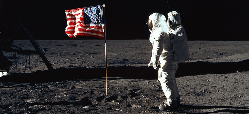 Government Hall of Fame inductee Buzz Aldrin salutes the American flag on the surface of the moon in July 1969.