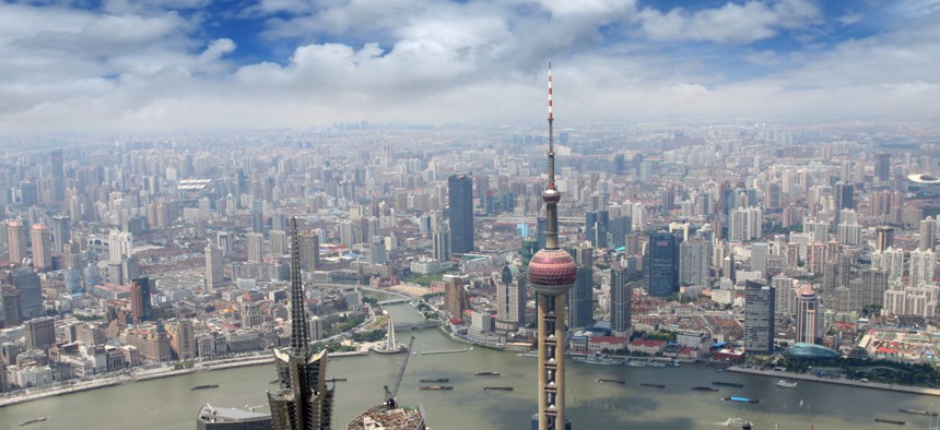 A planned shift in the TSP's international fund investments to include sanctioned Chinese companies has riled Senators. Above, an aerial view of Shanghai.
