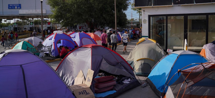 Rows of tents are clustered near the Gateway International Bridge in Matamoros, Mexico.