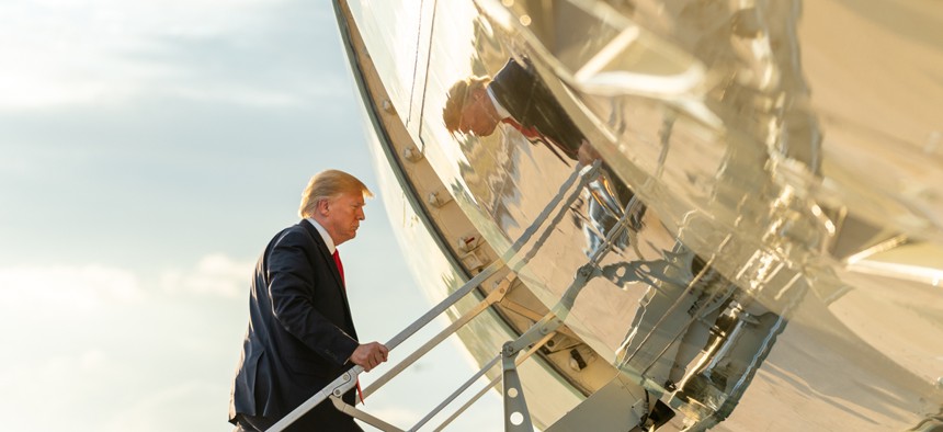 President Trump boards Air Force One at Austin-Bergstrom International Airport in Texas Wednesday for his flight back to Joint Base Andrews in Maryland.