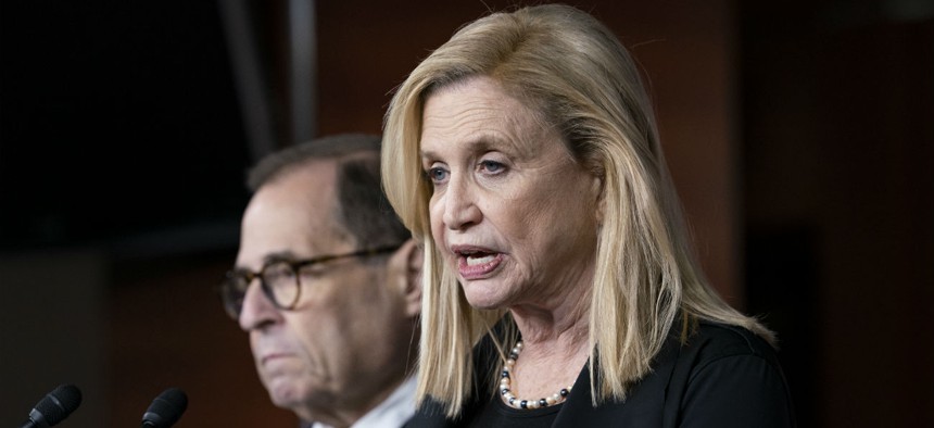 Rep. Carolyn Maloney, chair of the House Committee on Oversight and Reform, joined at left by Rep. Jerrold Nadler, chairman of the House Judiciary Committee, discusses the impeachment investigation on Oct. 31.