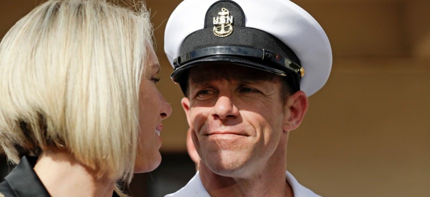 The former Navy SEAL Edward Gallagher, right, Aug. 1, 2019