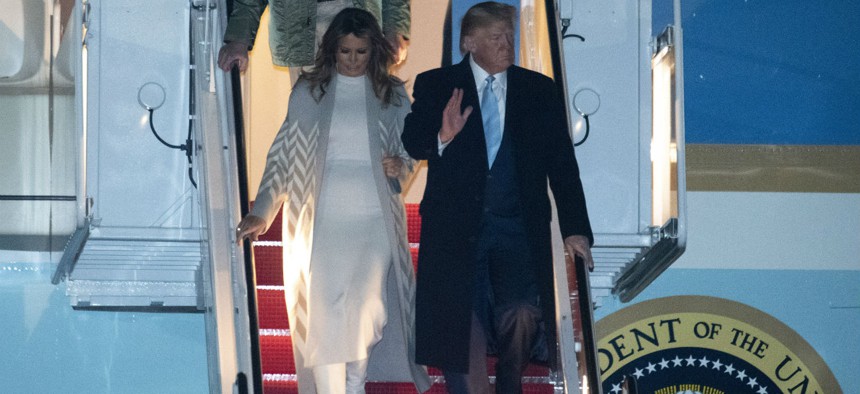 President Trump and his family exit Air Force One on Jan. 5 following a trip to his Mar-a-Lago estate in Florida. 
