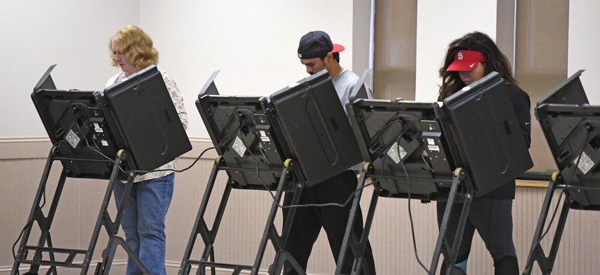 Voters are shown at a polling place in St. Louis in 2016.