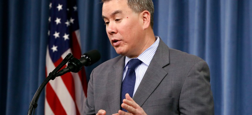 Under Secretary of Defense for Policy John Rood speaks during a 2018 news conference at the Pentagon.