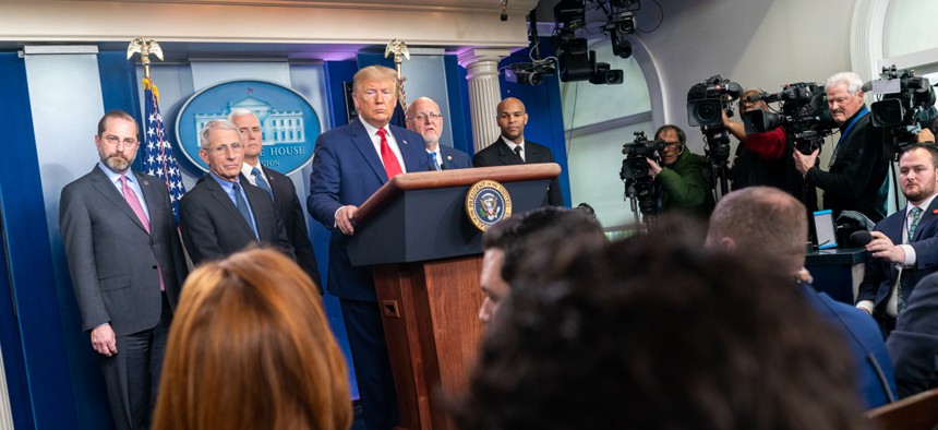 President Donald J. Trump, joined by Vice President Mike Pence, takes questions from reporters during a Coronavirus Task Force update on Saturday.