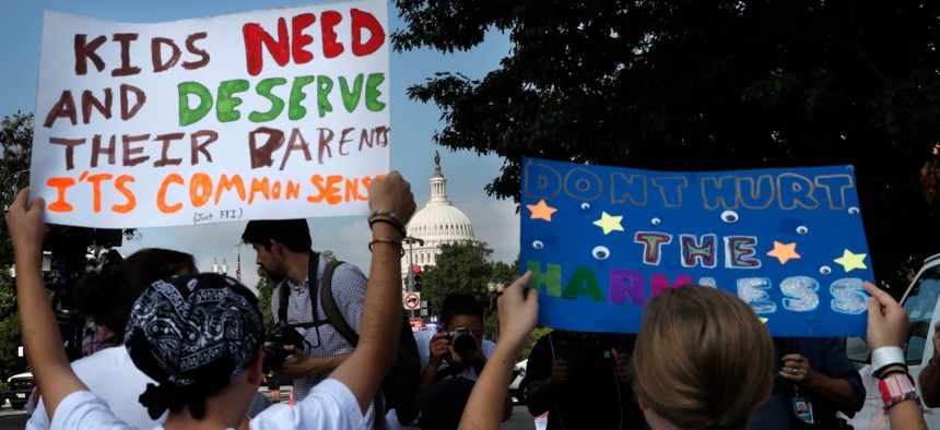 Protesters demonstrate against the family separation policy in July 2018. 