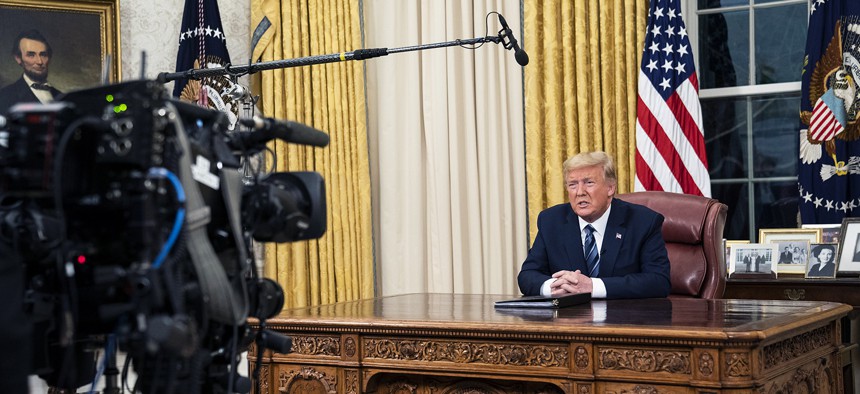  President Donald J. Trump addresses the nation from the Oval Office of the White House Wednesday evening.