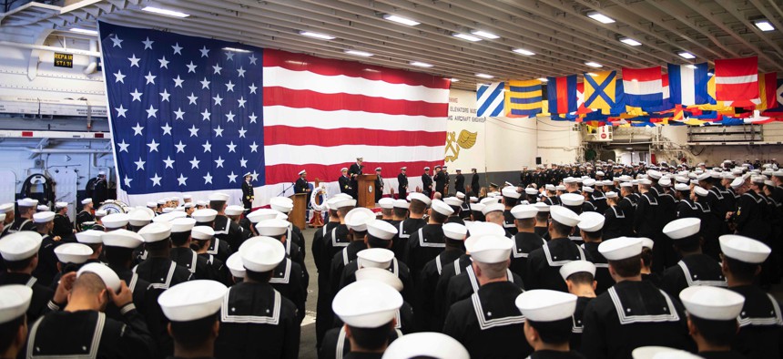 On Feb. 11, 2020, the crew of the USS Boxer gathered in the hangar bay during Boxer’s 25th anniversary celebration. Boxer was commissioned on Feb. 11, 1995 in Pascagoula, Miss.