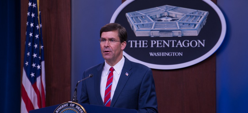 Defense Secretary Mark Esper speaks during a briefing at the Pentagon on Monday.
