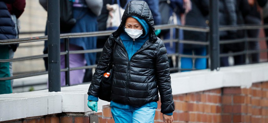A medical worker outside a Department of Veterans Affairs medical center in New York on March 23.