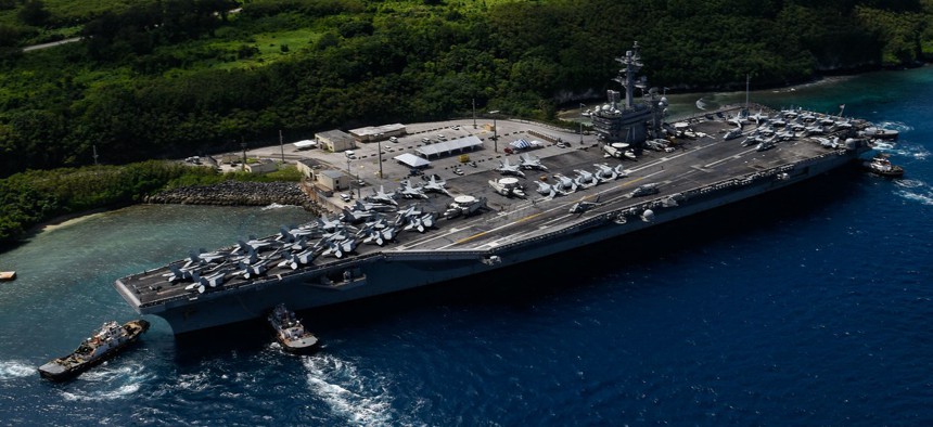 The aircraft carrier USS Roosevelt departs Guam in November 2017. 