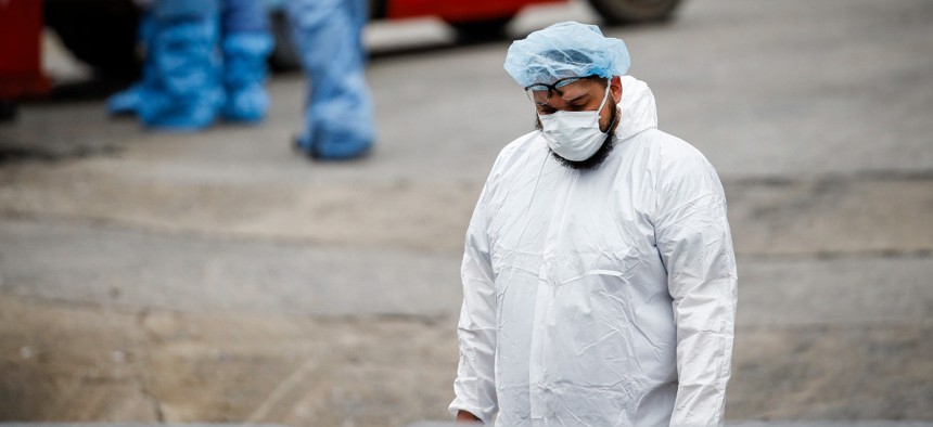 A medical worker wearing personal protective equipment in New York on March 31.