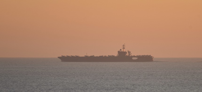 The aircraft carrier USS Theodore Roosevelt, shown here in 2019, is currently docked in Guam and has quarantined the majority of its crew.