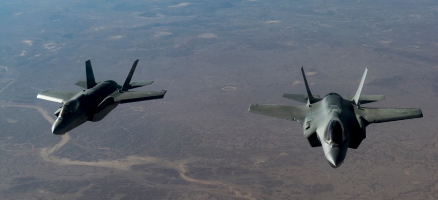 Two U.S. Air Force F-35 Lightning II aircraft, assigned to the 34th Expeditionary Fighter Squadron, fly in formation over the U.S. Central Command area of responsibility, in January. 