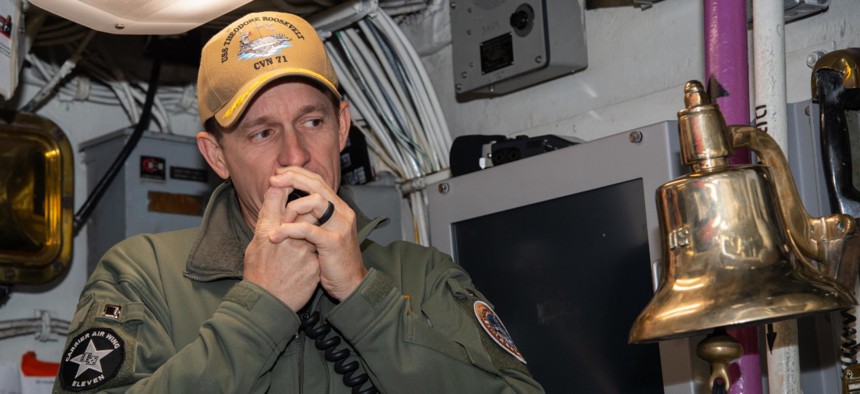 Capt. Brett Crozier, then-commanding officer of the aircraft carrier USS Theodore Roosevelt (CVN 71), addresses the crew on Jan. 17, 2020. 