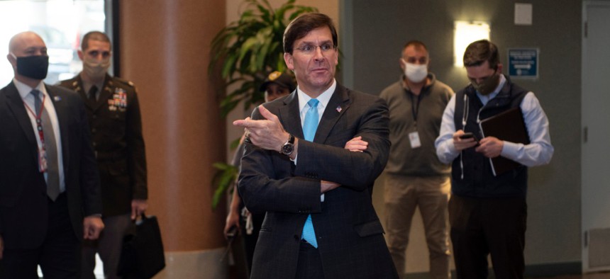 Secretary of Defense Mark Esper is greeted by staff members of the Federal Emergency Management Agency during a visit. 