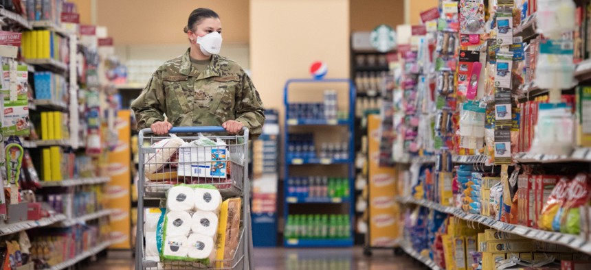 Staff Sgt. Alexandra Haytasingh, 944th Security Forces Squadron fire team leader, shops for groceries on April 16 in the Commissary at Luke Air Force Base, Ariz. 
