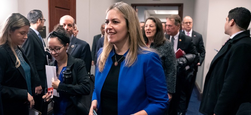 Bill author Rep. Jennifer Wexton, D-Va., and other members of the House arrive for a briefing by the coronavirus task force in February. 