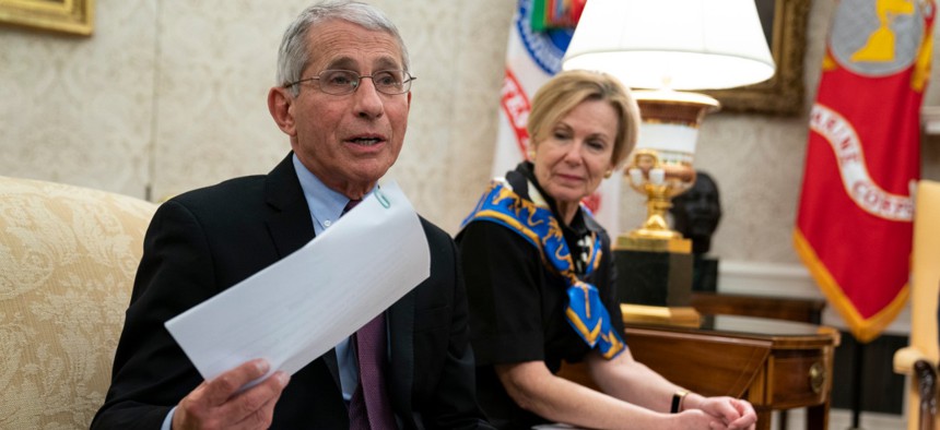 National Institute of Allergy and Infectious Diseases Director Dr. Anthony Fauci speaks during an April meeting between President Trump and Gov. John Bel Edwards, D-La. Fauci is one of the officials in a self-quarantine now. 