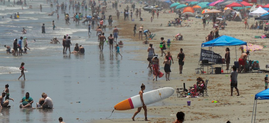 People gather on the beach for the Memorial Day weekend in Port Aransas, Texas, on May 23. Dr. Deborah Birx, White House coronavirus task force coordinator, has said she is concerned about people not practicing social distancing. 