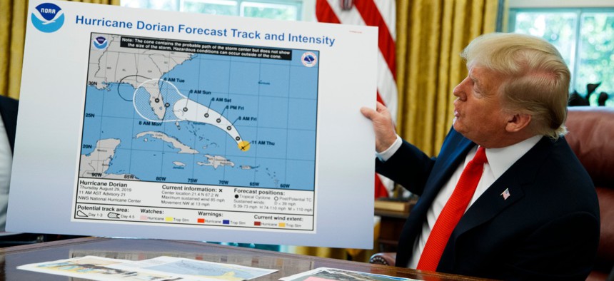 President Donald Trump showing a hurricane projection map that had been altered with a Sharpie in 2019.