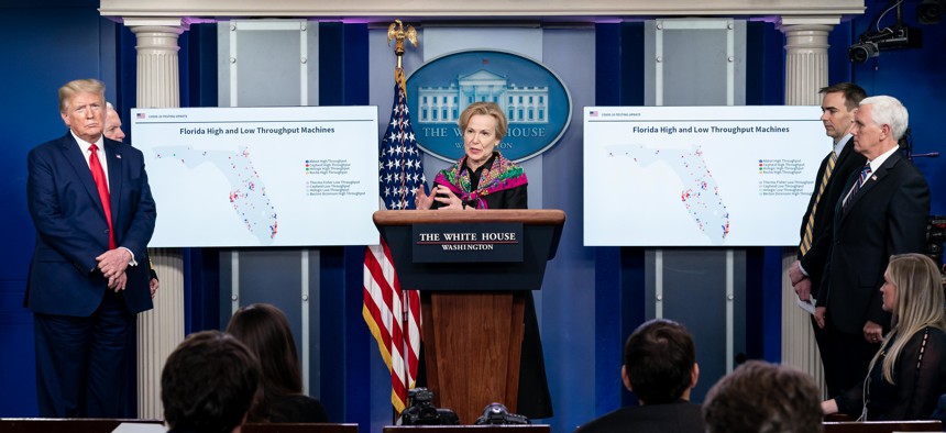 The White House Coronavirus Task Force addresses the press in April.
