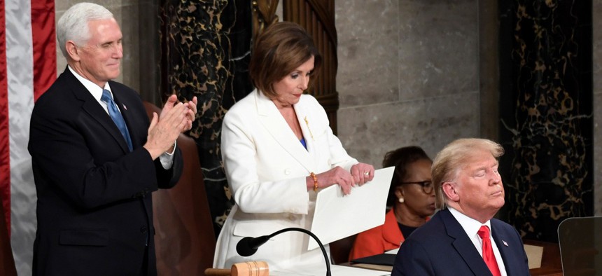 House Speaker Nancy Pelosi, D-Calif., tears her copy of President Trump's State of the Union address after he delivered it to a joint session of Congress on Capitol Hill in Washington, on Feb. 4. 