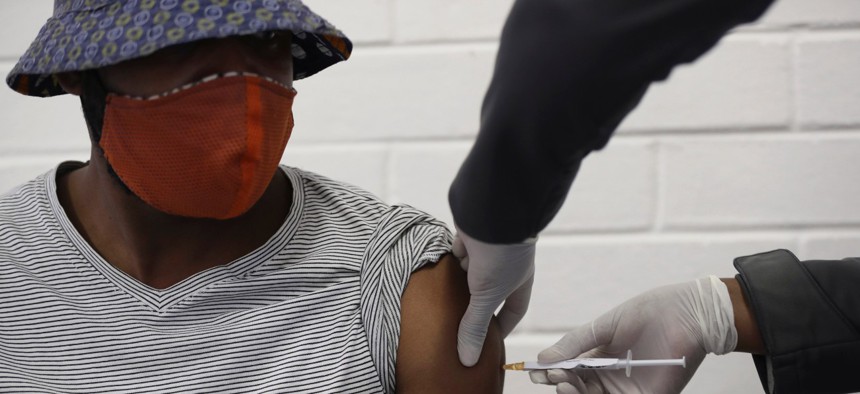 A vaccine volunteer gets an injection at the Chris Hani Baragwanath hospital in Soweto, Johannesburg, in June. 