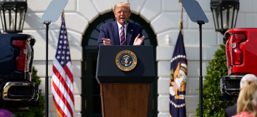 President Trump speaks during an event on regulatory reform on the South Lawn of the White House Thursday. 