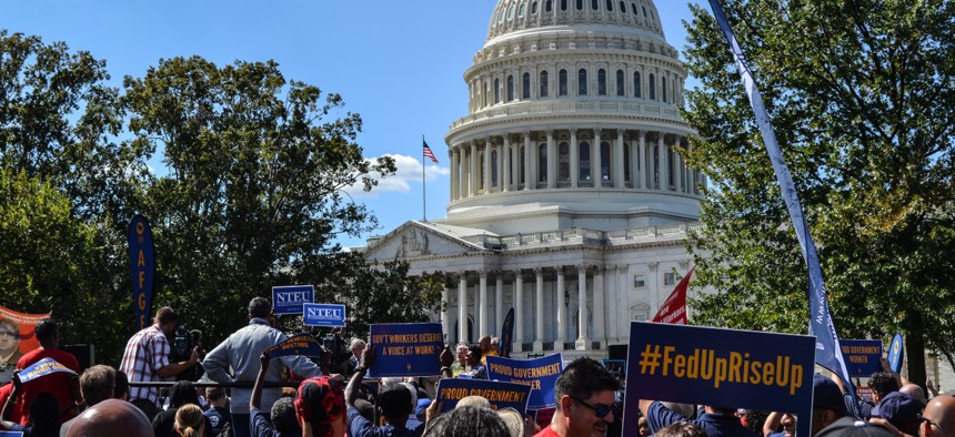 Federal employee union members rally near the Capitol in September 2019. 