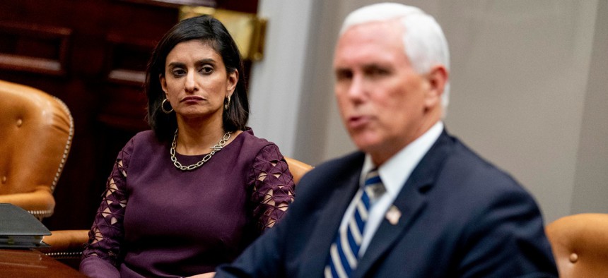 Vice President Mike Pence, right, accompanied by Administrator of the Centers for Medicare and Medicaid Services Seema Verma, left, participates in a meeting on safety and quality for nursing homes on Sept. 17. 