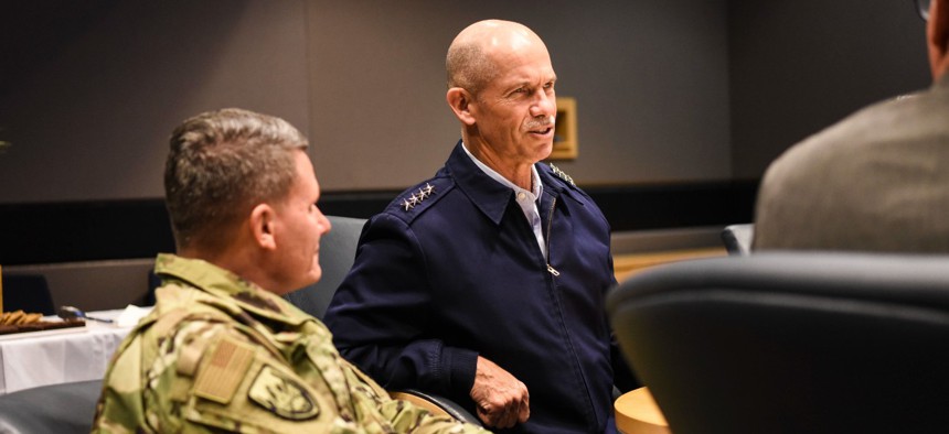 U.S. Coast Guard Vice Commandant Charles Ray speaks with members of Lockheed Martin and Defense Contract Management Agency Col. Lance French at a briefing at the Lockheed Martin facility in Marietta, Ga., in October 2018.