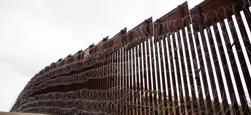 The border wall is shown near Nogales, AZ in 2019.