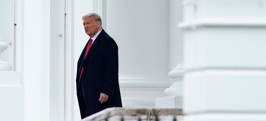 President Donald Trump walks out of the North Portico of the White House, Monday, Oct. 26, 2020, in Washington, as he departs for campaign events in Pennsylvania.