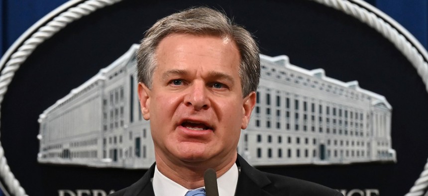 FBI Director Christopher Wray speaks during a press conference at the Justice Department on Oct. 7. 