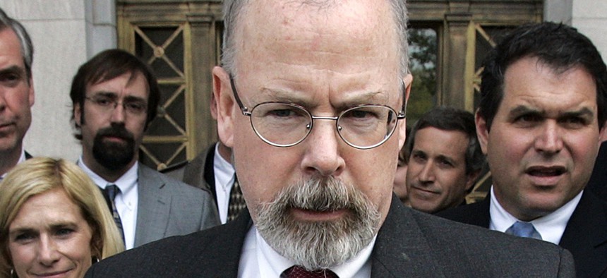 In this April 25, 2006, file photo, U.S. Attorney John Durham speaks to reporters on the steps of U.S. District Court in New Haven, Conn.