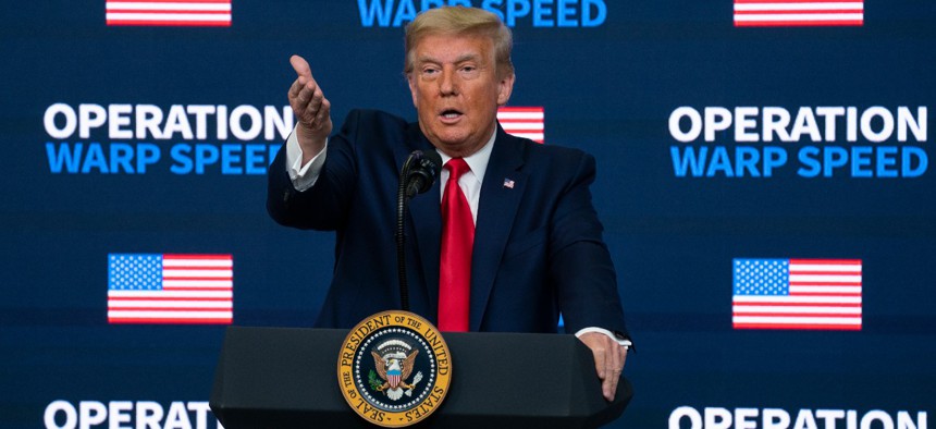 President Trump speaks during an "Operation Warp Speed Vaccine Summit" on Dec. 8. President-elect Biden urged the Trump administration to increase manufacturing and prepare for swift distribution of a coronavirus vaccine. 