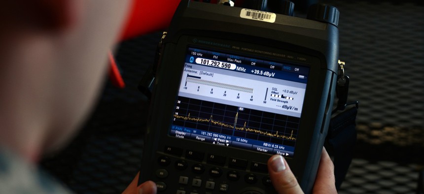 U.S. Air Force Staff Sgt. Geoffery Smith, 20th Communications Squadron installation spectrum manager, views the display on a radio spectrum analyzer at Shaw Air Force Base, S.C., on Jan. 13, 2017. 
