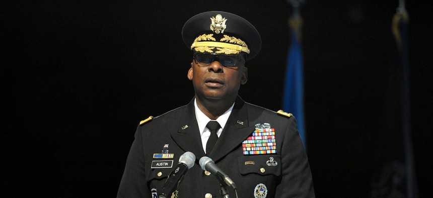 Gen. Lloyd J. Austin III, addresses a crowd of family, friends and peers during the Swearing-In Ceremony in 2012.