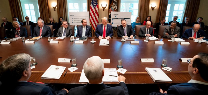 President Trump presides over a Cabinet meeting at the White House in October 2019.