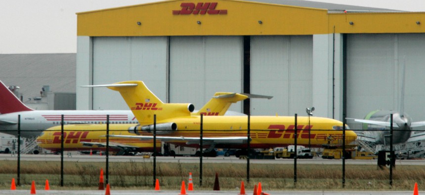 Air cargo planes sit at a DHL air shipping hub in Wilmington, Ohio.