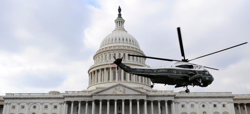 A Marine helicopter with former President George W. Bush on board departs from the East Front of the U.S. Capitol on Jan. 20, 2009.