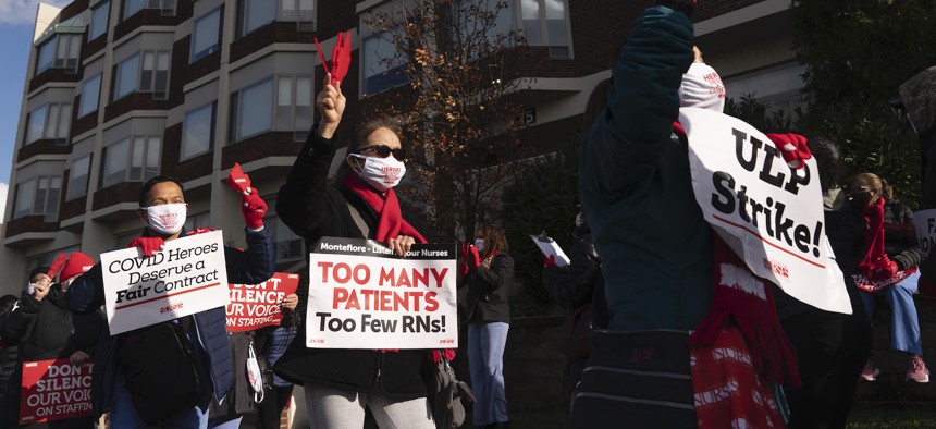 Nurses at Montefiore New Rochelle Hospital picket over safe staffing issues during the coronavirus pandemic, Tuesday, Dec. 1, 2020, in New Rochelle, N.Y. 