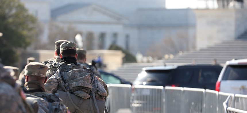 U.S. Soldiers with the Virginia National Guard march near the U.S. Capitol building in Washington, D.C., Jan. 14.