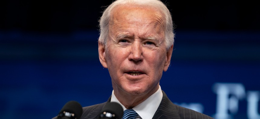 President Biden answers questions from reporters in the South Court Auditorium on the White House complex on Monday. 